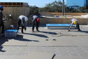 Workers Thermo plastic roofing