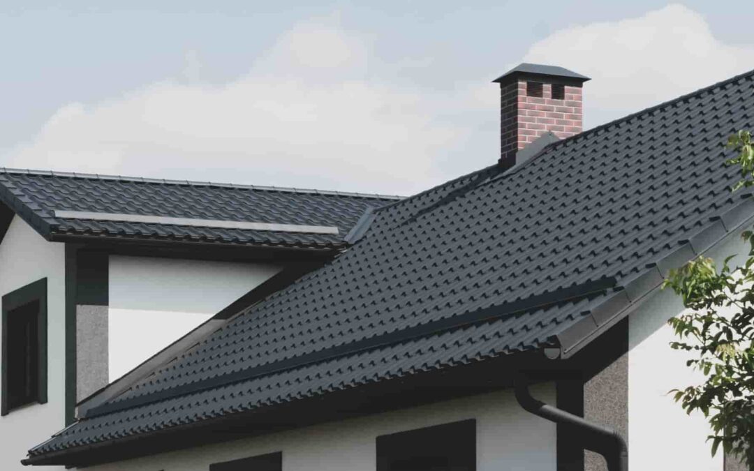The dark-colored roof of a new residential private house