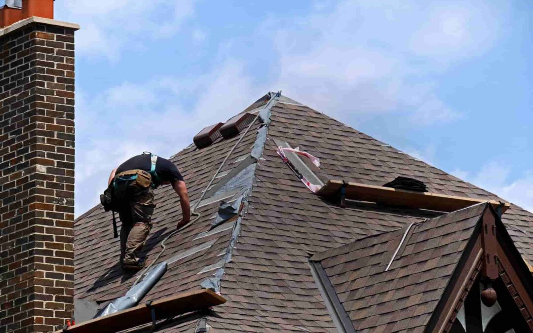 roof expert working on roof maintenance